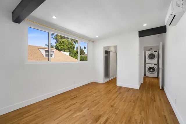 a view of a livingroom with wooden floor