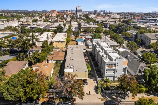 an aerial view of a city with lots of residential buildings