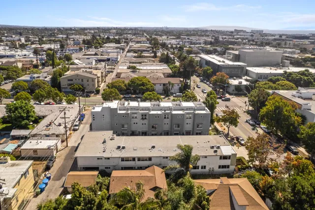 an aerial view of a city with lots of residential buildings