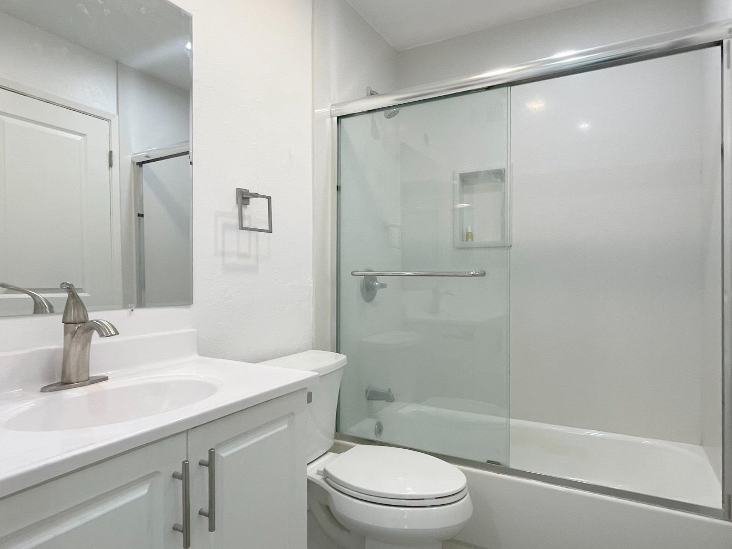 5070 Plaza Corona Santa Clara, CA 95054 - Photo 11 of 18 a bathroom with a sink a toilet and shower