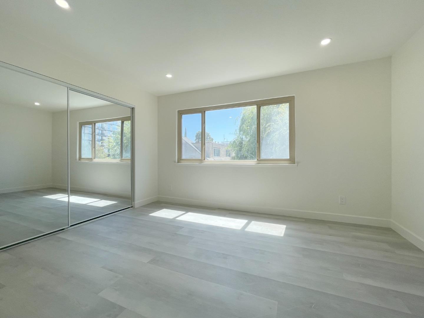 5070 Plaza Corona Santa Clara, CA 95054 - Photo 10 of 18 an empty room with windows and entrance