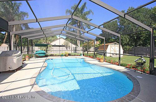 12634 Brady Road Jacksonville, FL 32223 - Photo 2 of 29 Screened/solar heated pool