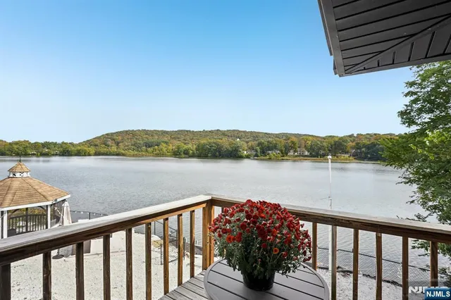 a bedroom with bed and a window