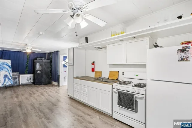 a bathroom with a sink and a curtain