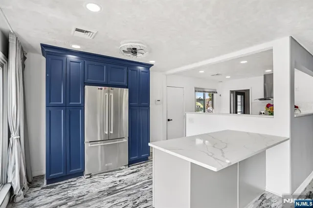 a view of room with window and furniture