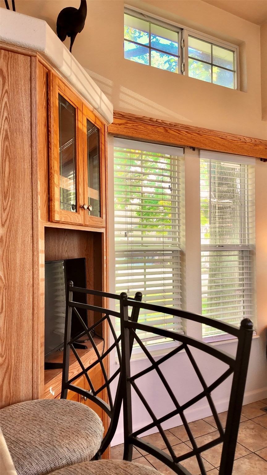11720 Thousand Trail, Unit 13 Conroe, TX 77304 - Photo 12 of 35 a view of a dining room with furniture and a window