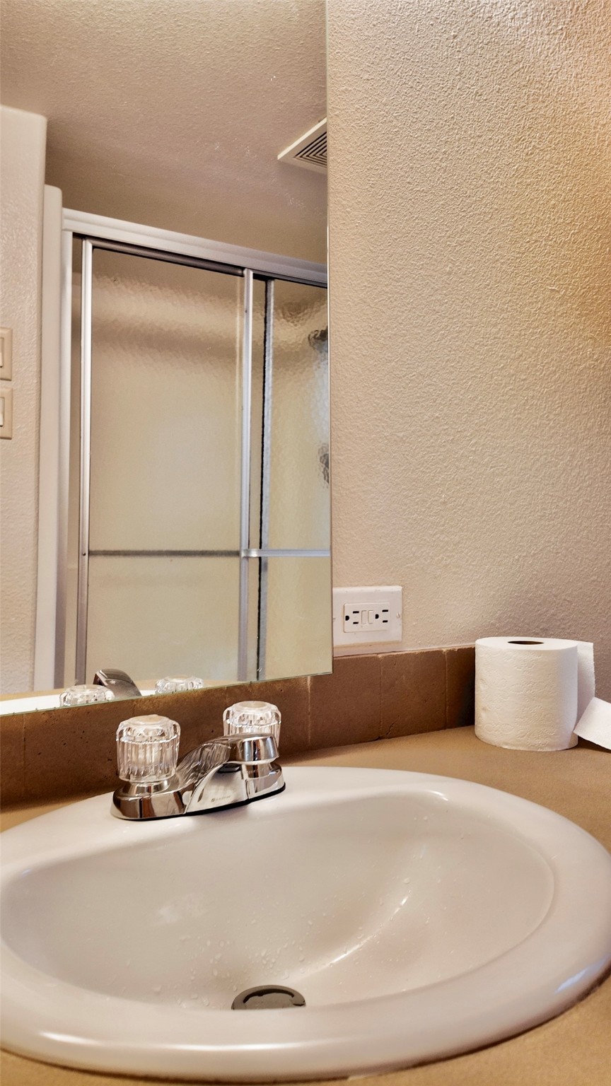 11720 Thousand Trail, Unit 13 Conroe, TX 77304 - Photo 17 of 35 a bathroom with a sink
