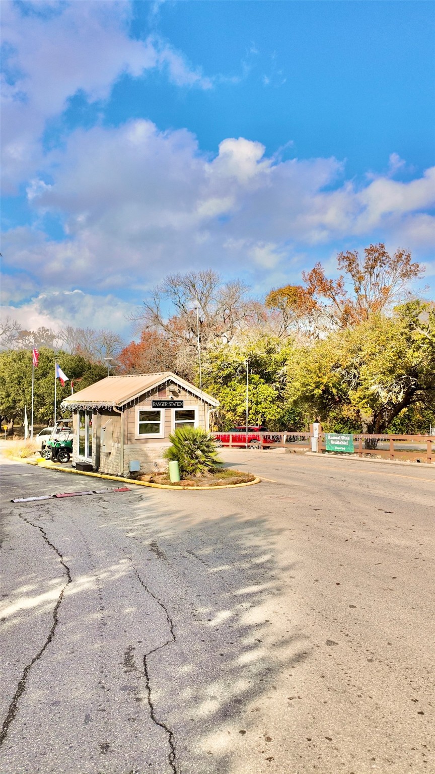11720 Thousand Trail, Unit 13 Conroe, TX 77304 - Photo 28 of 35 a view of a town with big houses