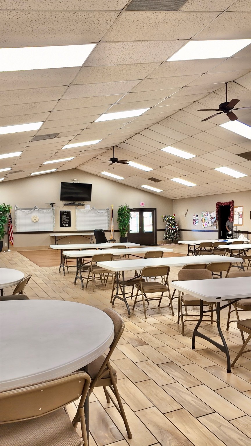 11720 Thousand Trail, Unit 13 Conroe, TX 77304 - Photo 30 of 35 a living room with lots of furniture and view of kitchen
