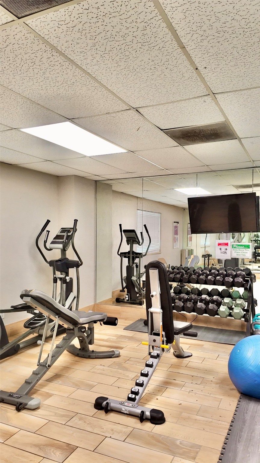 11720 Thousand Trail, Unit 13 Conroe, TX 77304 - Photo 31 of 35 a room with gym equipment