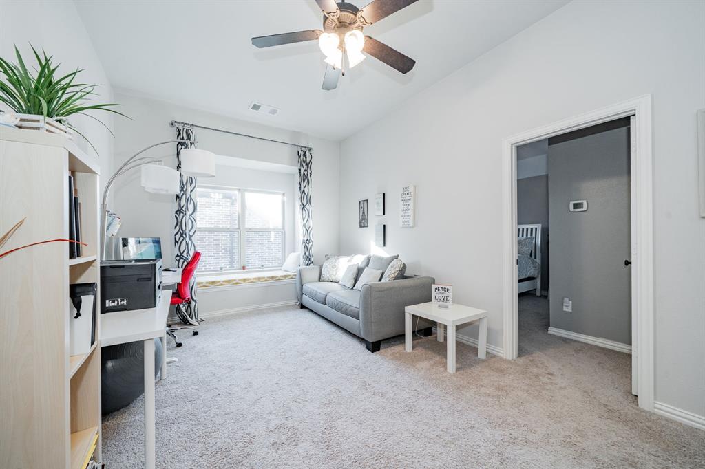 944 Highpoint Way Roanoke, TX 76262 - Photo 26 of 39 a living room with furniture and white walls