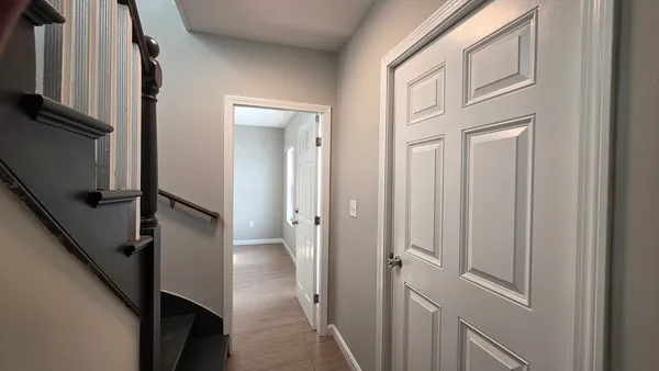 a view of a hallway with a elevator