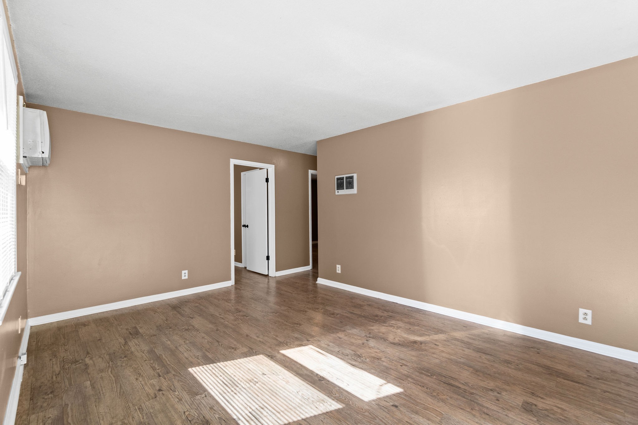 1908 Batts Lane, Unit C Clarksville, TN 37042 - Photo 3 of 14 a view of an empty room with wooden floor