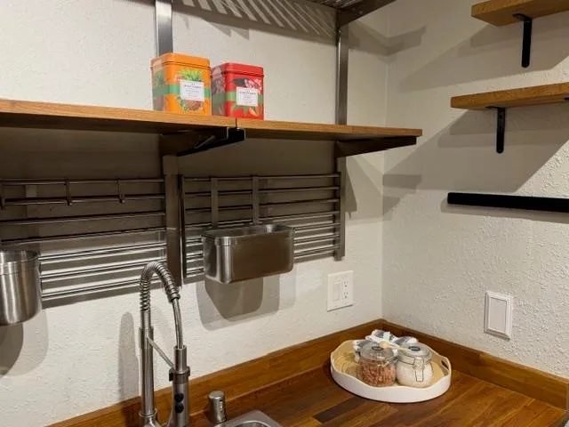 a kitchen with a stove and a microwave