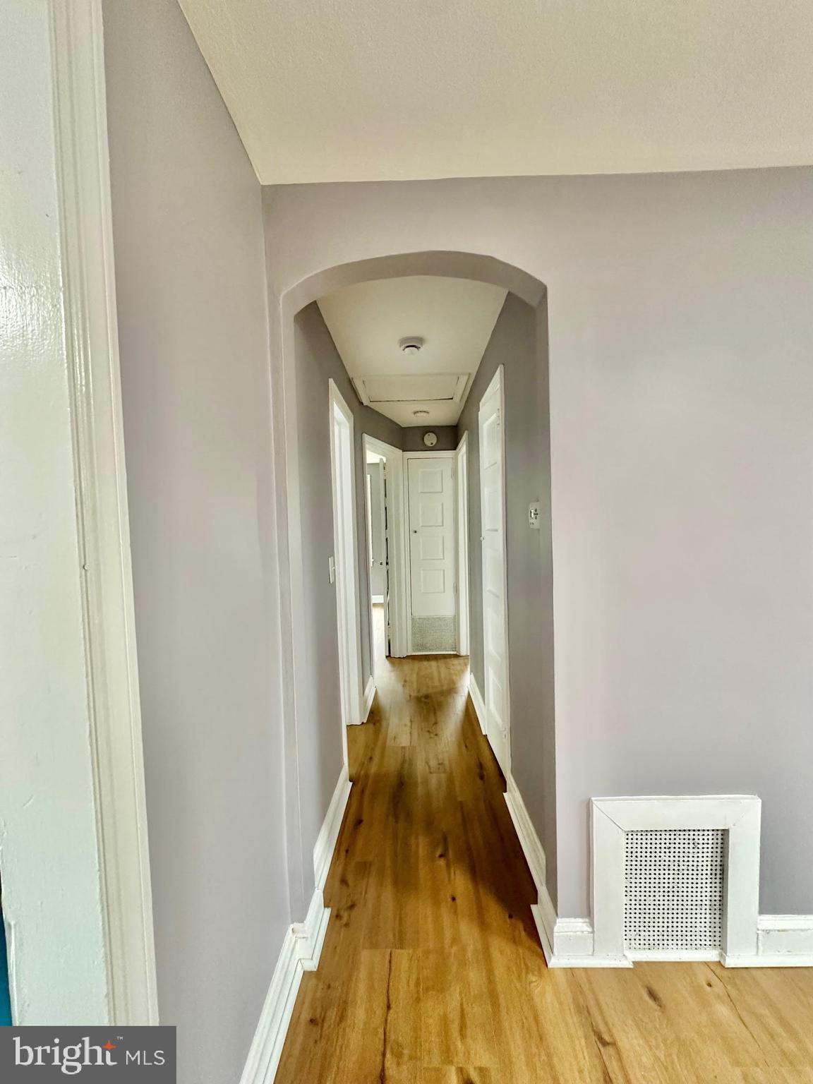 1 Marion Court, Unit 2 Ewing, NJ 08618 - Photo 4 of 9 a view of a hallway with wooden floor