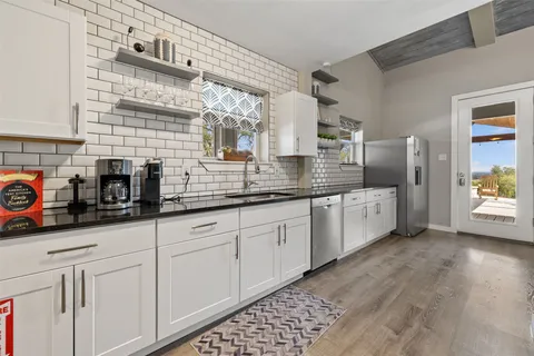 $849,500 | 900 Deer Creek Circle, Dripping Springs, TX 78620