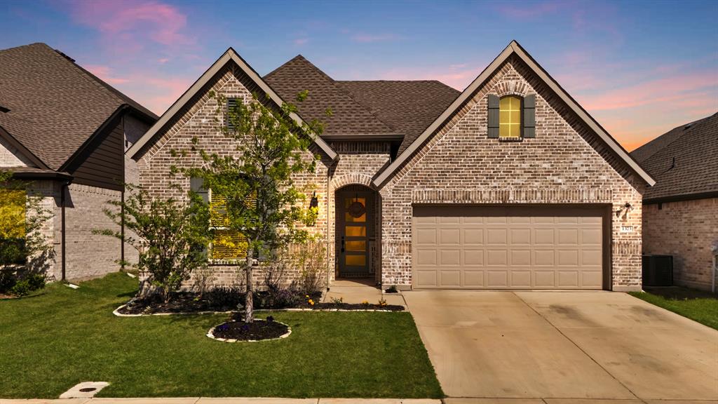 1373 Silverthorne Trail Justin, TX 76247 - Photo 1 of 1 a front view of a house with garden