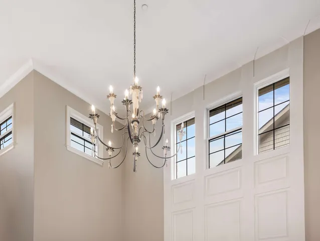 a view of a livingroom with furniture nad wooden floor