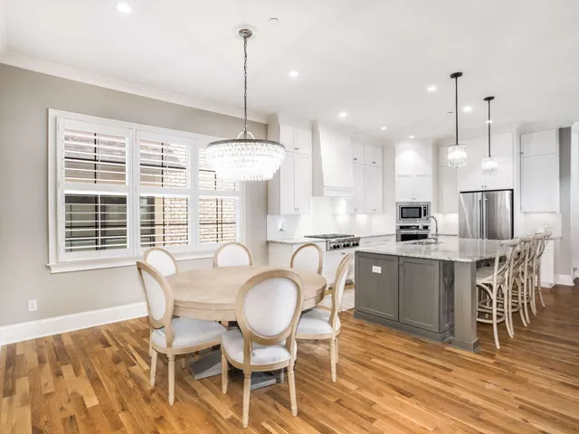 a bathroom with a sink double vanity shower and a bathtub