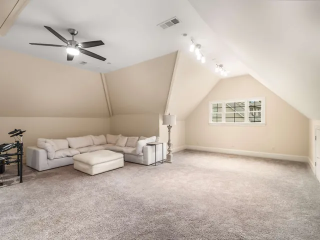 a view of a house with a street