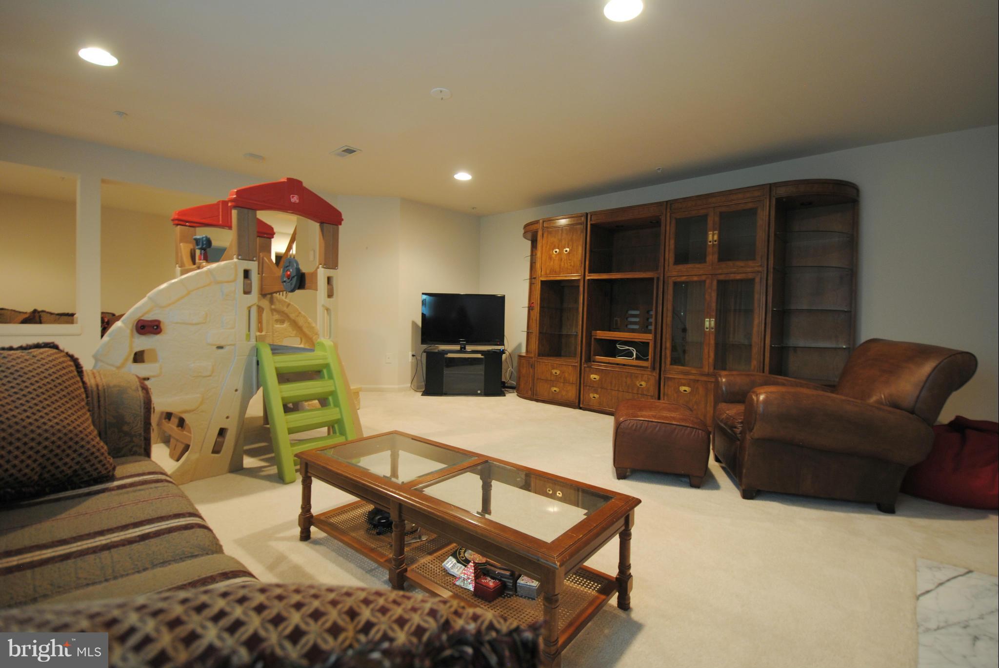 9118 Fox Park Road Clinton, MD 20735 - Photo 24 of 28 Lower Level Family Room