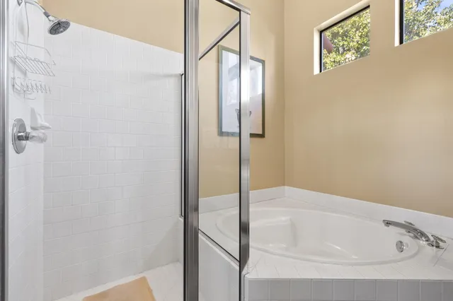 a view of a house with swimming pool and porch with furniture