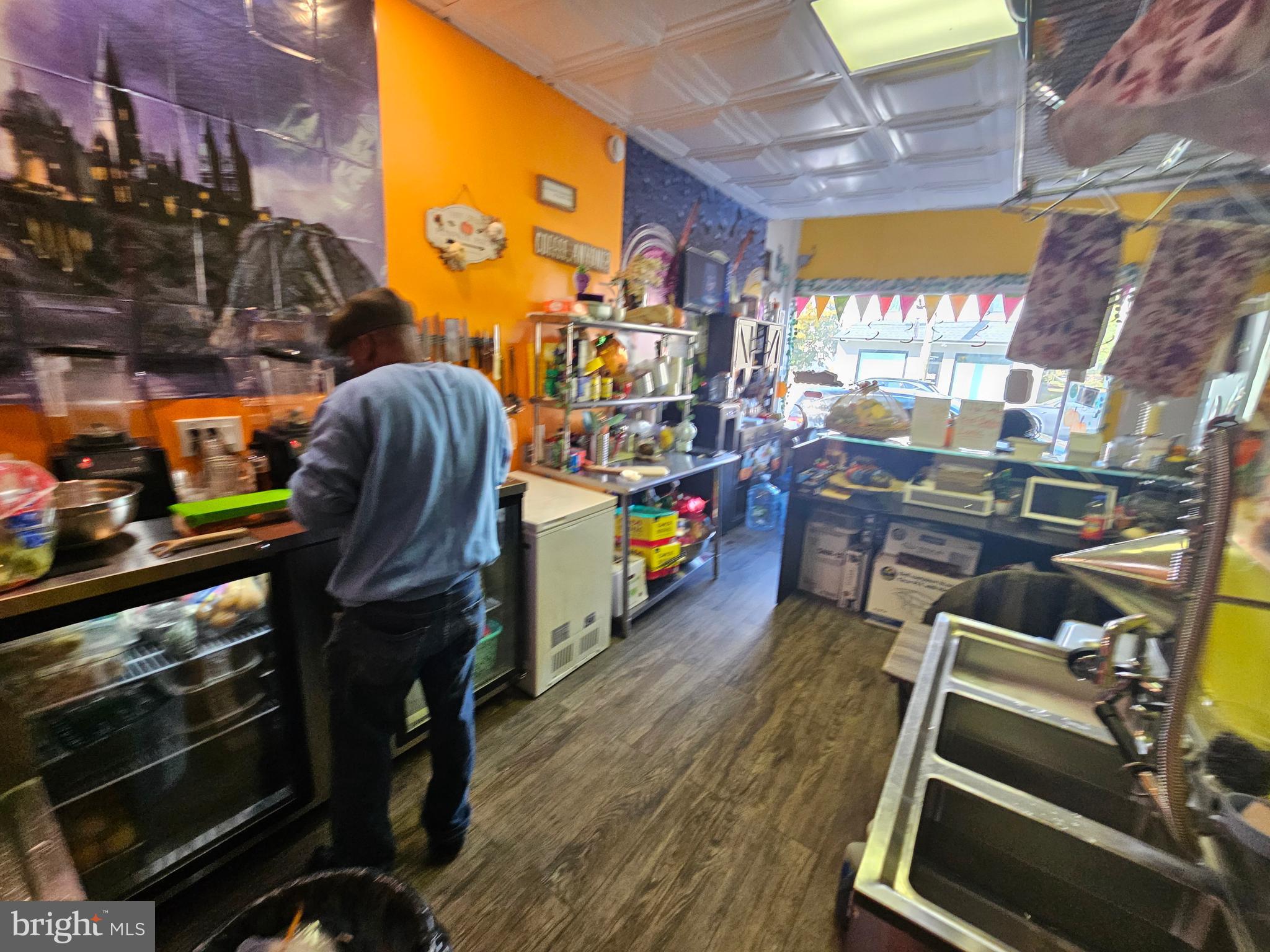 221 Broadway Westville, NJ 08093 - Photo 14 of 51 a living room filled with furniture