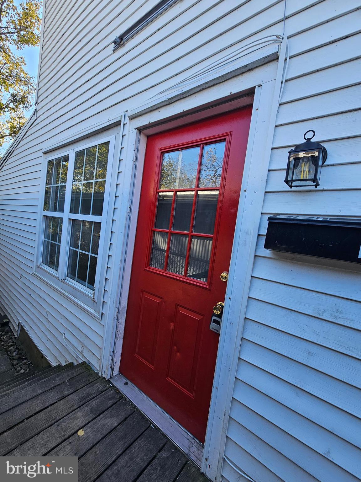 221 Broadway Westville, NJ 08093 - Photo 17 of 51 a view of front door of house