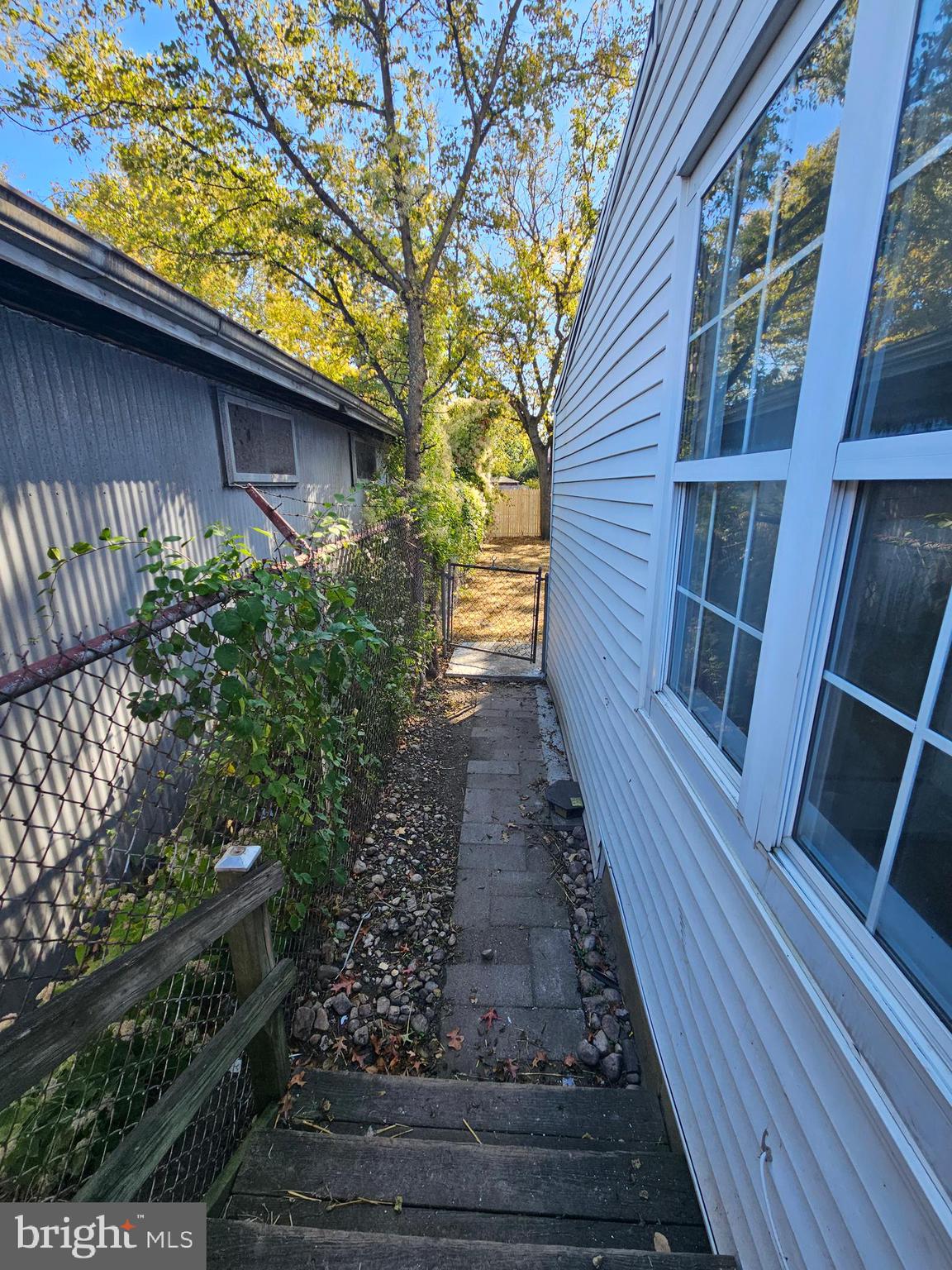 221 Broadway Westville, NJ 08093 - Photo 18 of 51 a view of a pathway with a backyard