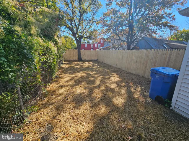 a view of a house with a tree