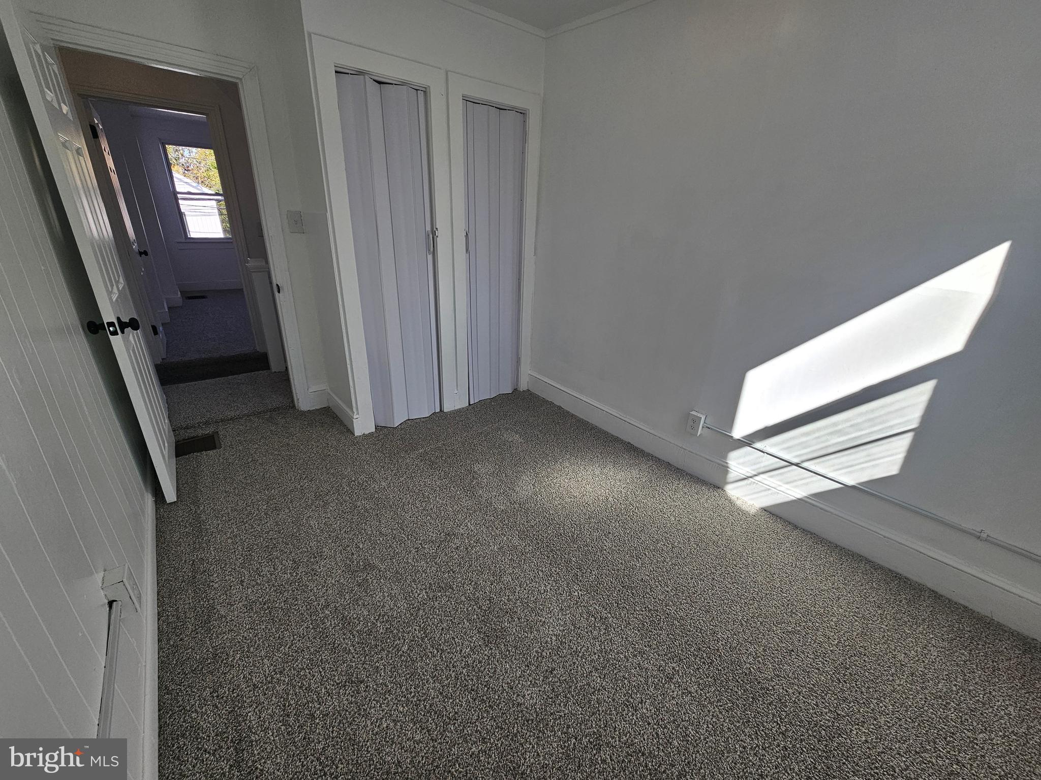 221 Broadway Westville, NJ 08093 - Photo 39 of 51 a view of empty room with windows