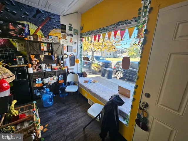 a room with lots of furniture and clutter