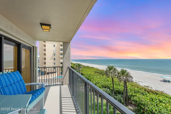 a view of a balcony with lake view