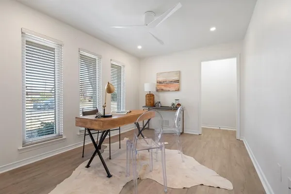 a workspace with furniture and a window