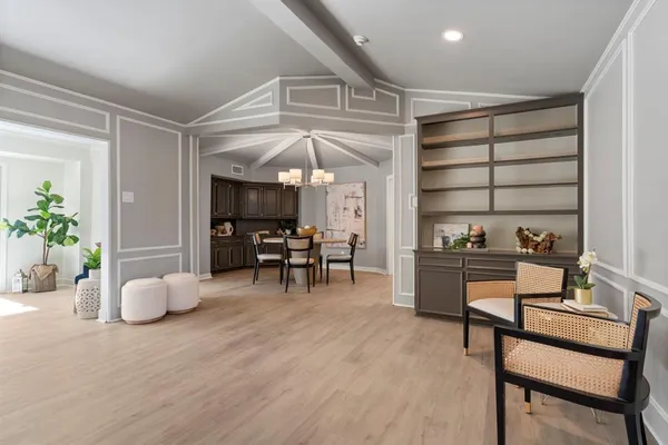 a workspace with furniture and window