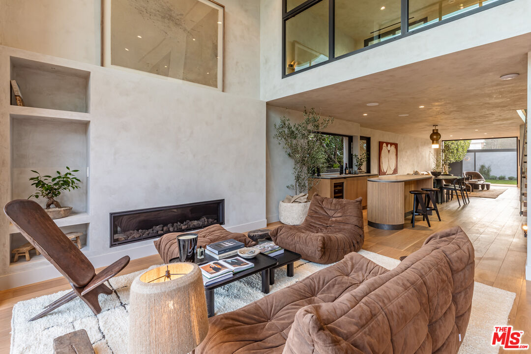 23505 Malibu Colony Road Malibu, CA 90265 - Photo 11 of 39 a living room with furniture and a table