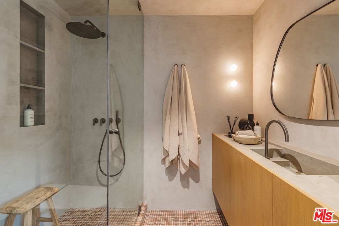 23505 Malibu Colony Road Malibu, CA 90265 - Photo 25 of 39 a bathroom with a sink and mirror