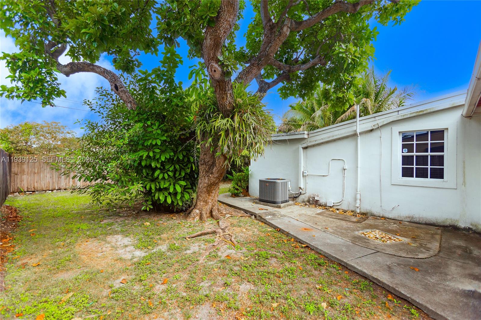6765 Southwest 51st Street Miami, FL 33155 - Photo 19 of 43 a front view of a house with garden