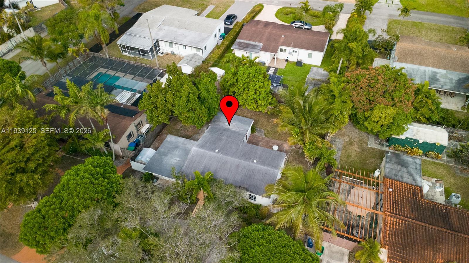 6765 Southwest 51st Street Miami, FL 33155 - Photo 2 of 43 an aerial view of house with yard and swimming pool