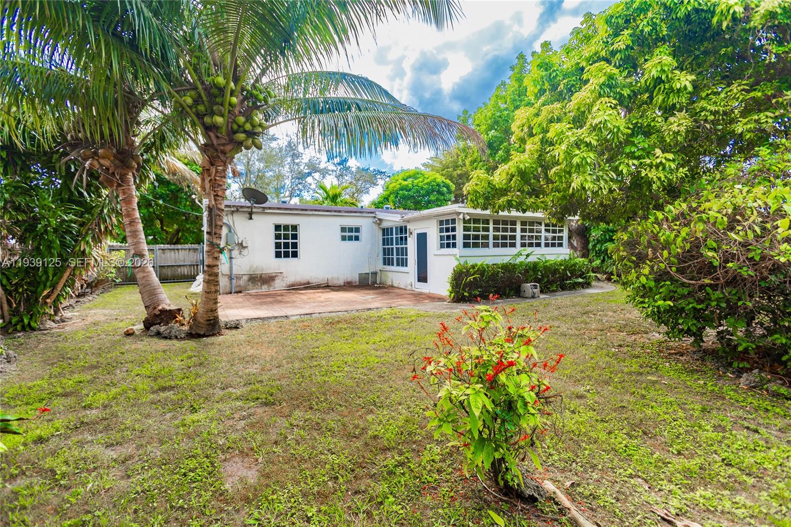6765 Southwest 51st Street Miami, FL 33155 - Photo 23 of 43 a view of a house with a yard