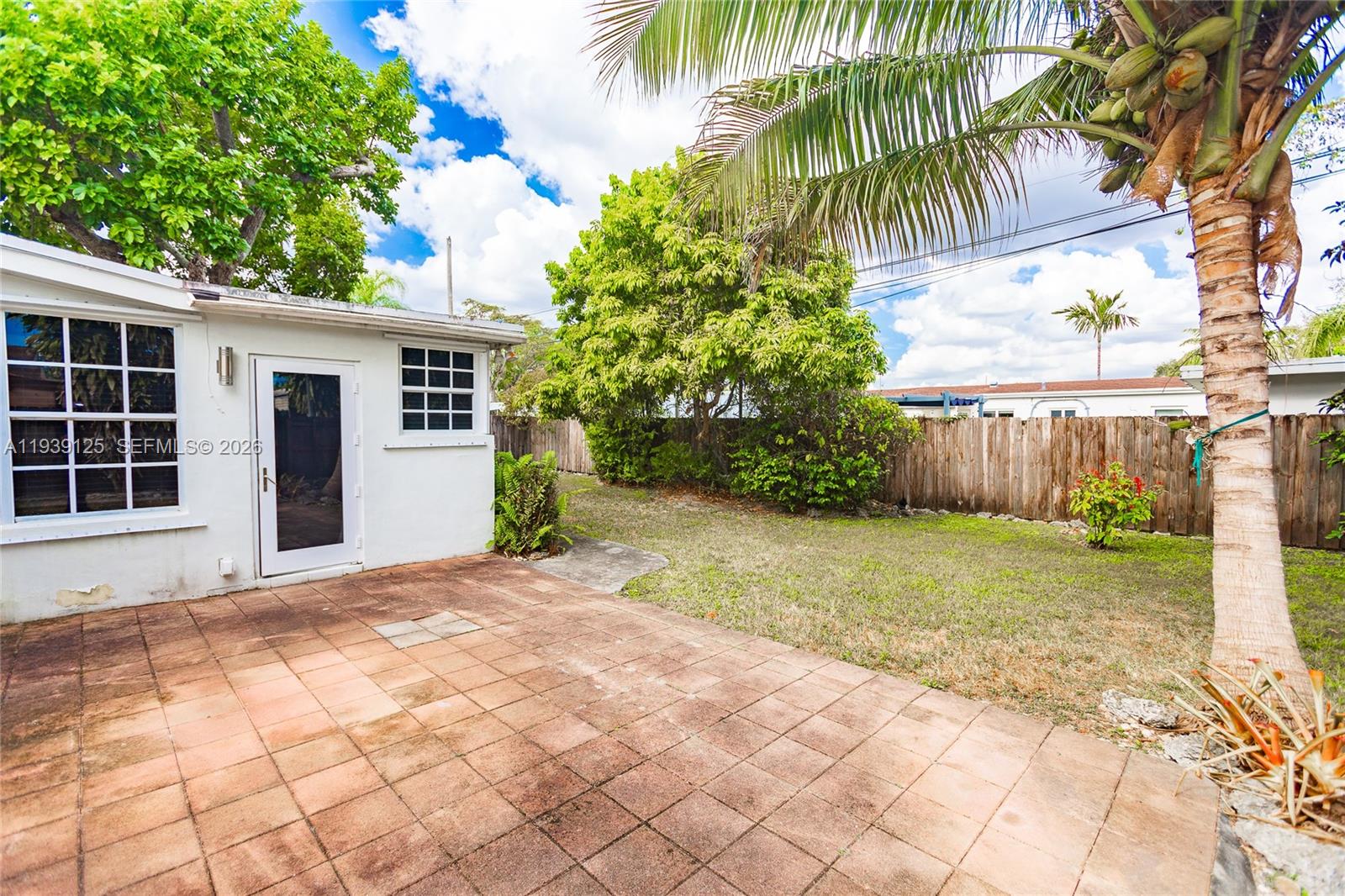 6765 Southwest 51st Street Miami, FL 33155 - Photo 25 of 43 a view of a backyard with a garden