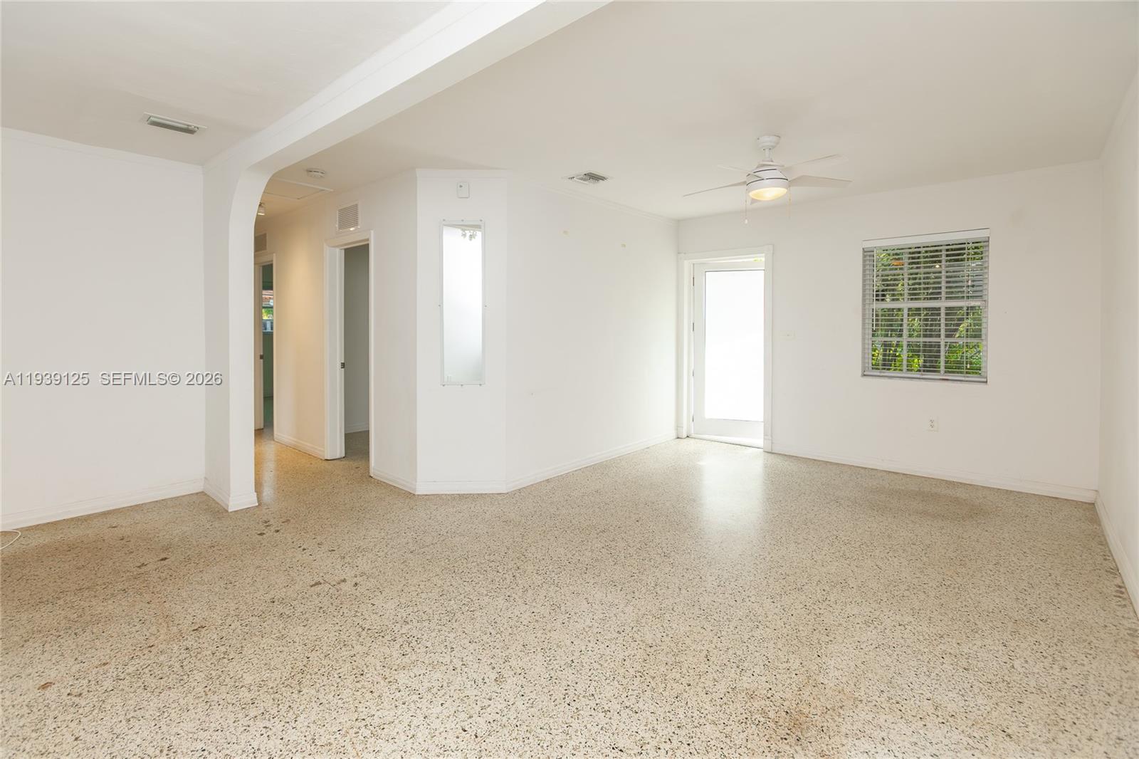 6765 Southwest 51st Street Miami, FL 33155 - Photo 28 of 43 an empty room with windows and closet