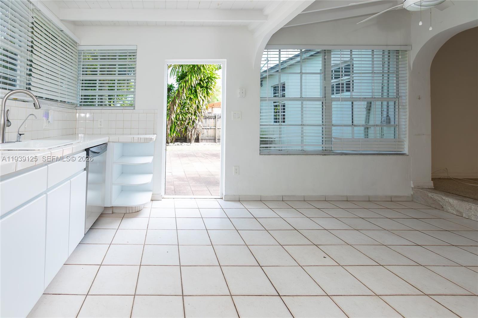 6765 Southwest 51st Street Miami, FL 33155 - Photo 34 of 43 a view of a kitchen that has a sink and cabinets