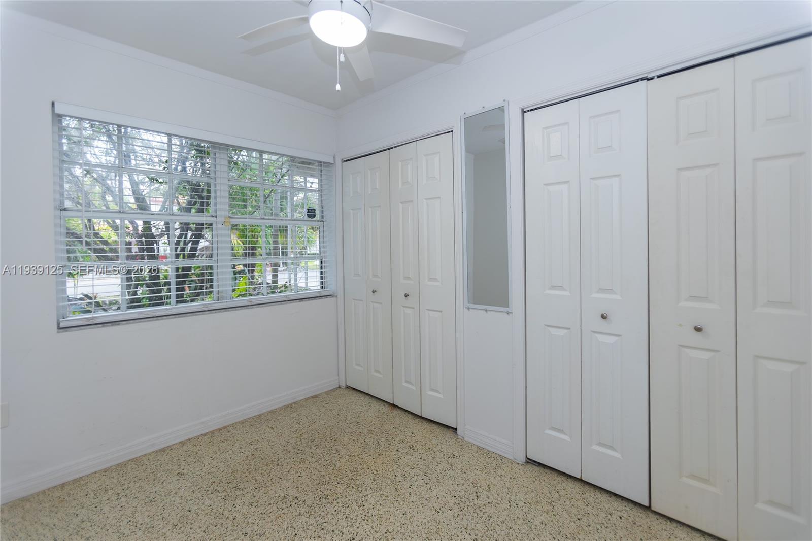 6765 Southwest 51st Street Miami, FL 33155 - Photo 37 of 43 a view of an empty room with a window