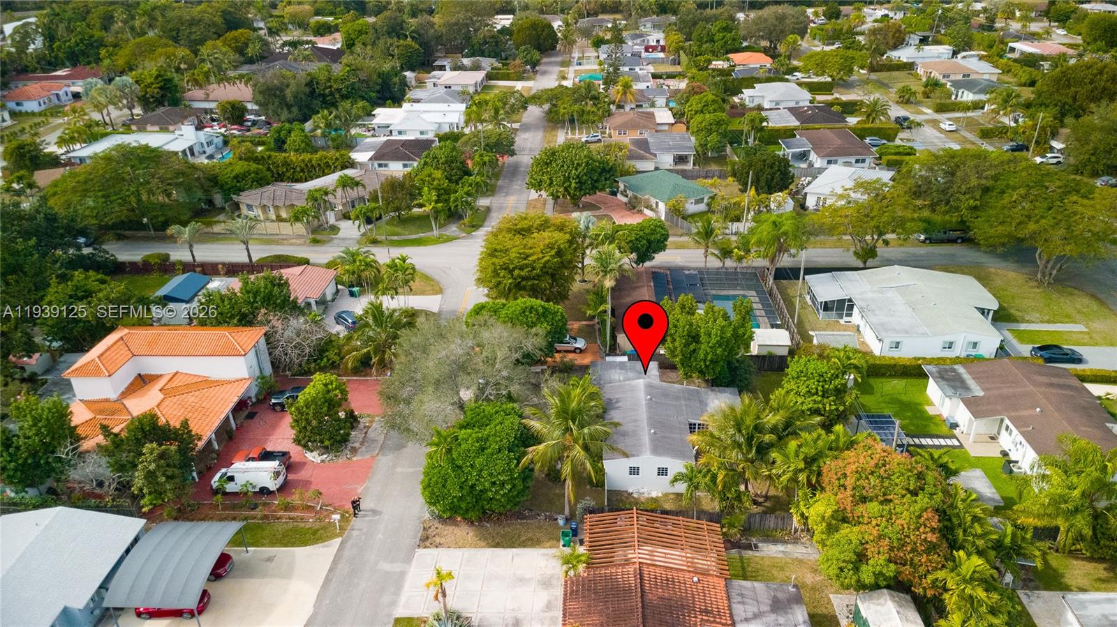 6765 Southwest 51st Street Miami, FL 33155 - Photo 4 of 43 an aerial view of residential houses with outdoor space and trees all around