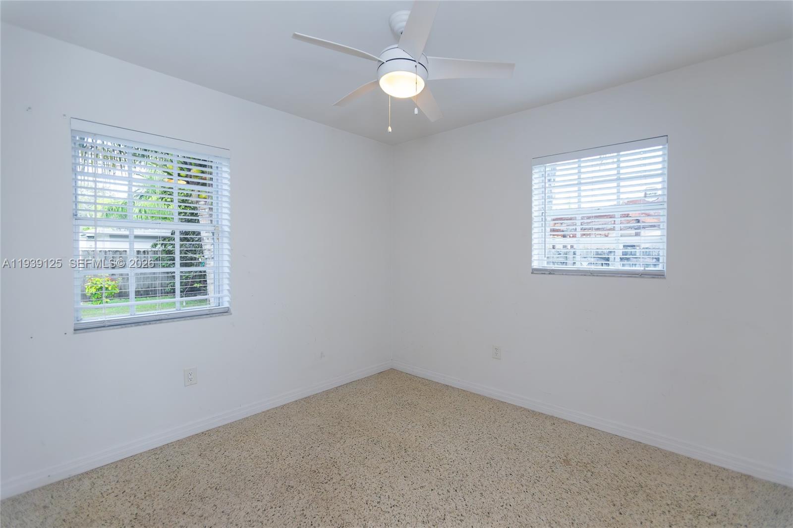 6765 Southwest 51st Street Miami, FL 33155 - Photo 41 of 43 an empty room with a window