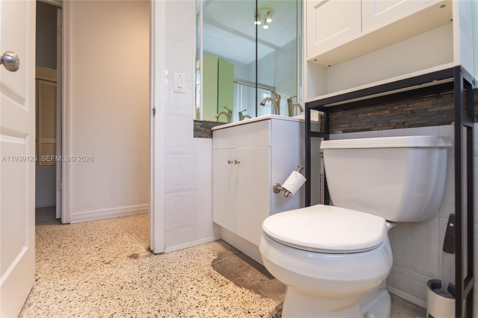 6765 Southwest 51st Street Miami, FL 33155 - Photo 43 of 43 a bathroom with a toilet and a shower
