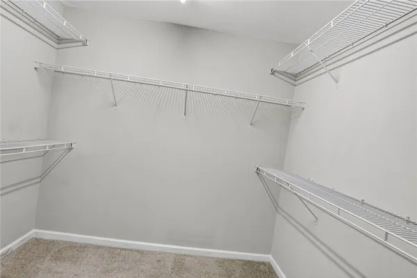 a view of a room with racks on the wall