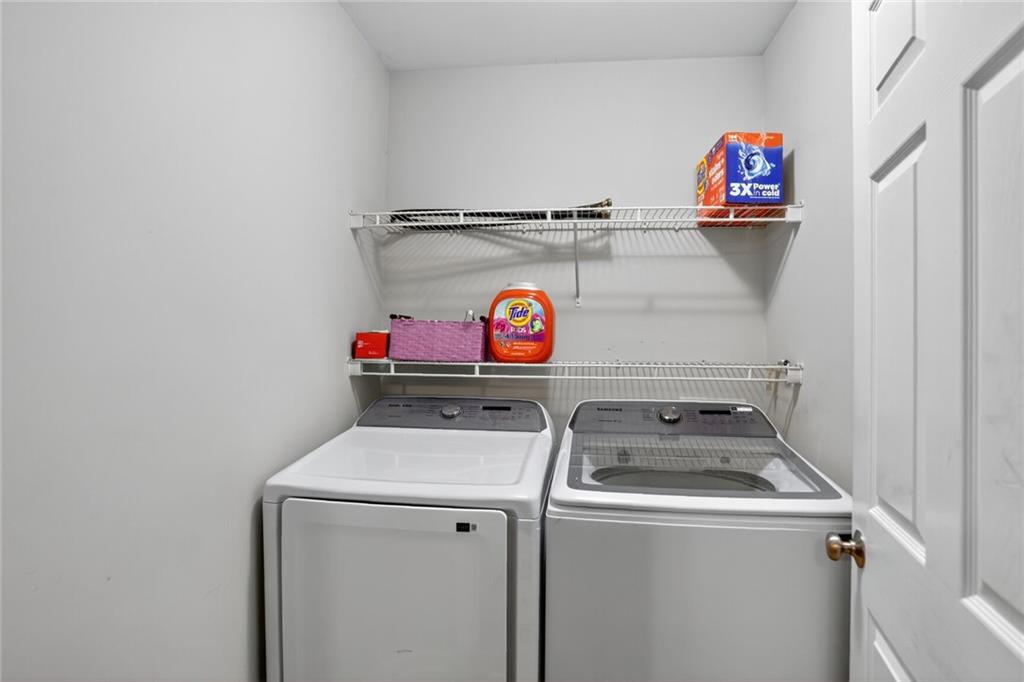3053 Hartright Bend Court Duluth, GA 30096 - Photo 22 of 24 a utility room with dryer and washer