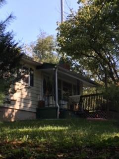 63236325 Ridgeview Road Knoxville, TN 37918 - Photo 3 of 13 a view of a house with backyard porch and sitting area
